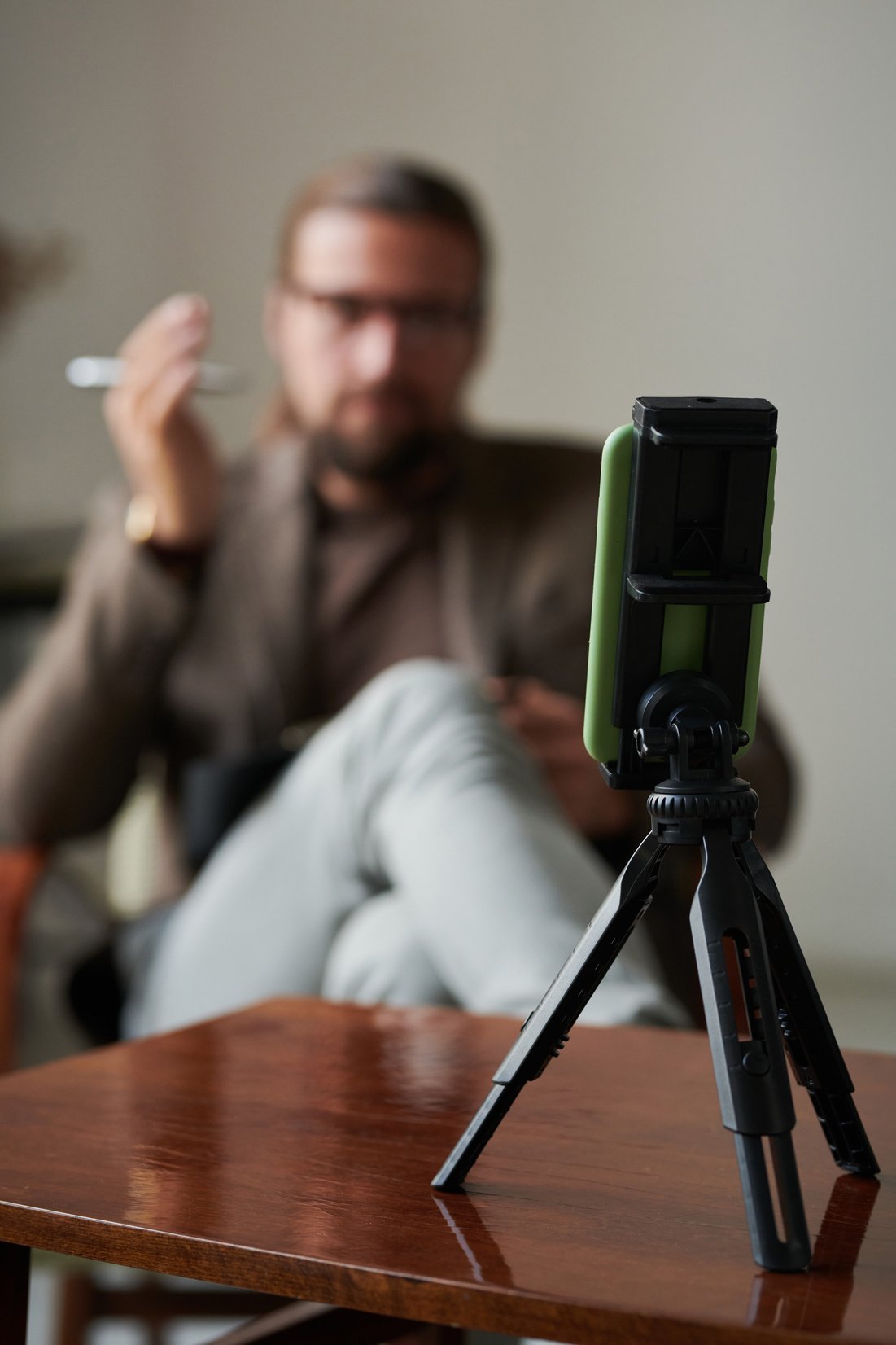 Psychologist Using Smartphone for Online Call